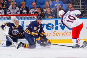 Ryan Miller, Christian Ehrhoff and Marian Gaborik