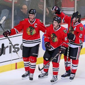 Jonathan Toews, Andrew Shaw, Duncan Keith