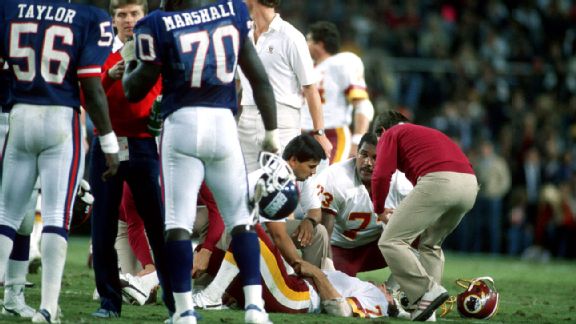 Lawrence Taylor and Joe Theismann