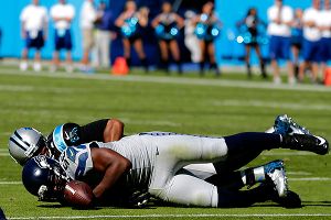 Cam Newton and Cliff Avril