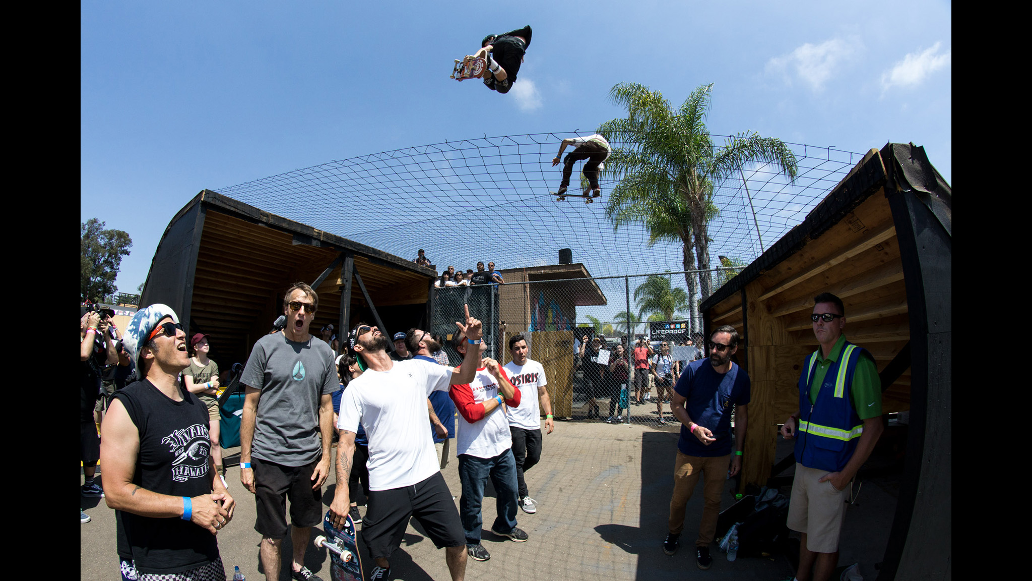 From left to right: Christian Hosoi, Tony Hawk and Bob Burnquist survey the racing.