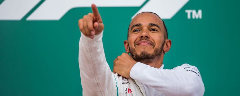 Lewis Hamilton capitalised on late drama to win the Azerbaijan Grand Prix.