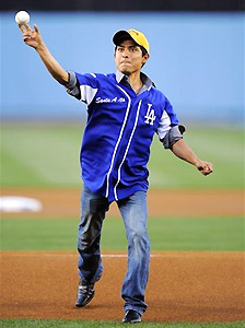 Kentucky Derby-winning jockey Mario Gutierrez throws out the first pitch prior to the Dodgers' game against the Giants.
