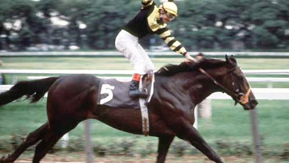 Seattle Slew wins the 1977 Triple Crown.