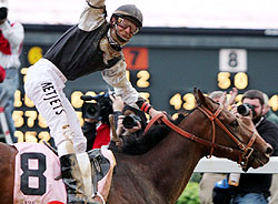 Calvin Borel celebrates his Kentucky Derby win on Mine That Bird.