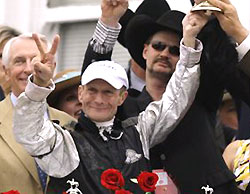 Calvin Borel celebrates his Kentucky Derby win on Mine That Bird.