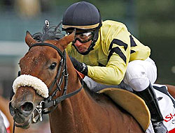 Rene Douglas rides Christmas Kid to a win at Keeneland in April of 2007.