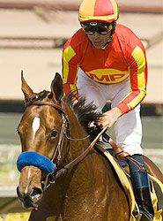Lookin At Lucky and jockey Garrett Gomez