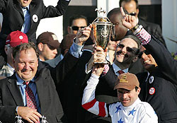 Trainer Richard Dutrow Jr. in the Kentucky Derby winner's circle after Big Brown's victory in 2008.