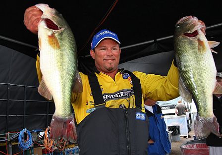 Lane shows off two nice largemouth the he boated early on Day Two of the SpongeTech Tennessee Triumph.