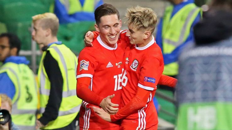 Wales' midfielder Harry Wilson, left, celebrates with teammate David Brooks after scoring a goal against the Republic of Ireland.