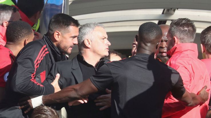 Jose Mourinho reacts after being provoked by Chelsea assistant Marco Ianni's celebration.