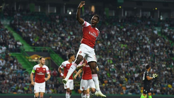 Danny Welbeck celebrates after scoring the winner in Arsenal's Europa League win over Sporting.