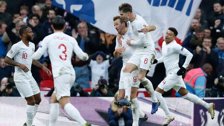 Harry Kane and England's defender John Stones celebrate