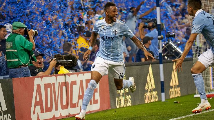 Khiry Shelton celebrates after scoring a goal for Sporting Kansas City in MLS.