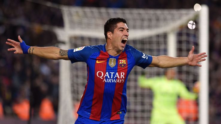 Luis Suarez celebrates his winner for Barcelona at the Camp Nou.