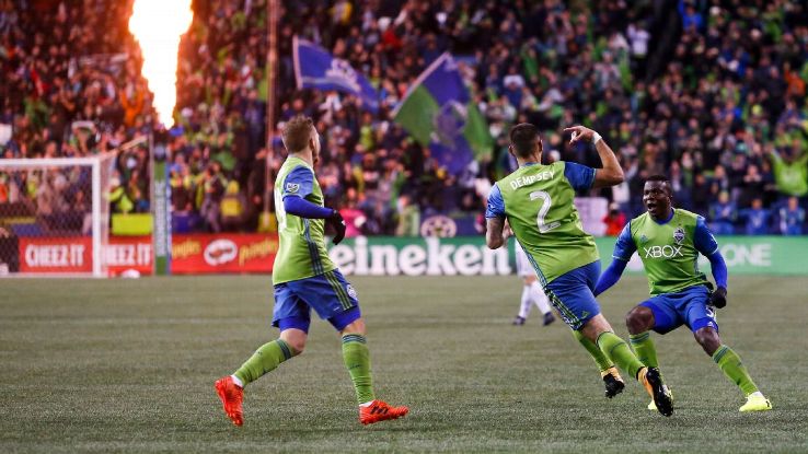 Clint Dempsey celebrates after putting Seattle in front against Vancouver in the MLS playoffs.