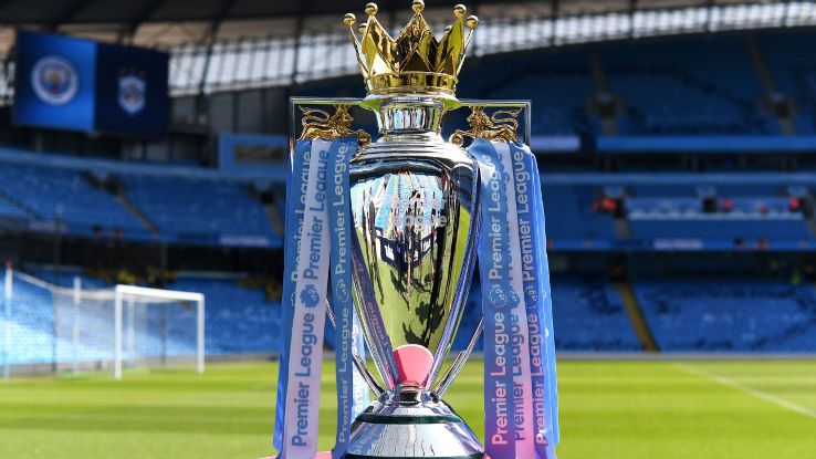 The Premier League trophy decked out in colours of 2017-18 champions Manchester City