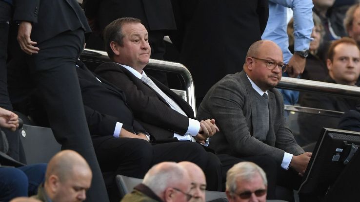 Newcastle owner Mike Ashley, centre, looks on during his team's Premier League match against Leicester.