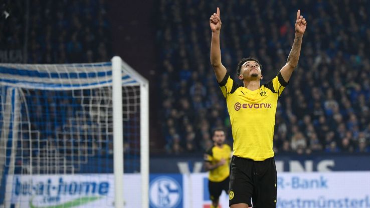 Jadon Sancho celebrates his goal for Borussia Dortmund against local rivals Schalke.