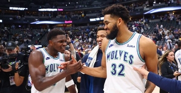 'Fully loaded' Wolves rally, end Nuggets' reign