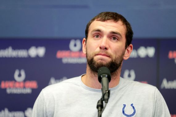 andrew luck wearing pink
