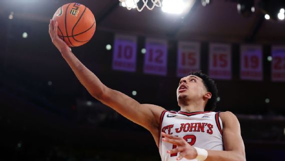 RJ Luis Jr. playing basketball