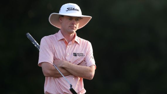 Joe Highsmith in wide-brimmed hat