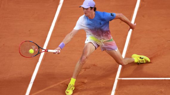 Joao Fonseca playing a shot during a match