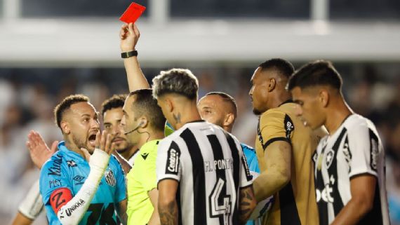 Neymar reacts‍ to the red card.