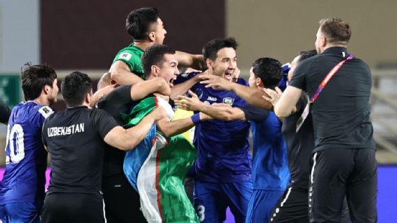 Uzbekistan ⁣celebrates reaching⁢ the World Cup finals for the first time.
