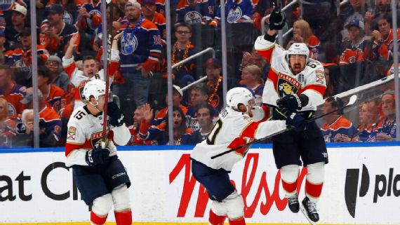 Brad Marchand celebrates his game-winning goal in double overtime against the Edmonton⁢ Oilers.