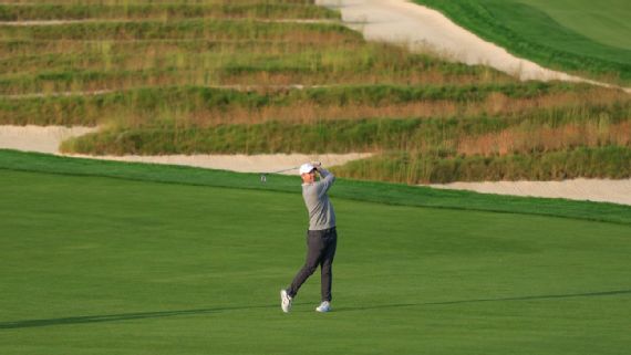 Rory McIlroy plays near the Church Pews bunker at Oakmont
