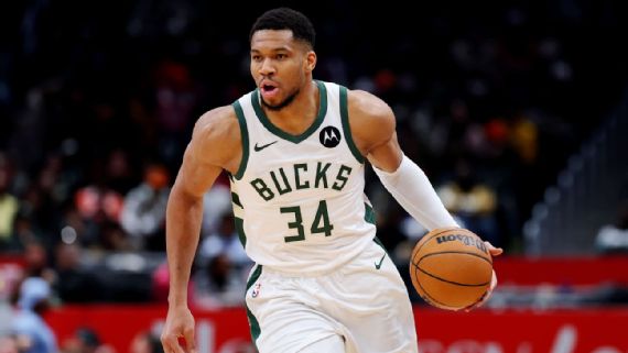 Giannis Antetokounmpo playing basketball.