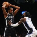 Nets win the game  but lose two starters  in Shanghai - NetsDaily