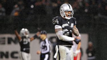 Charles Woodson's kids demanded an interception, and he delivered