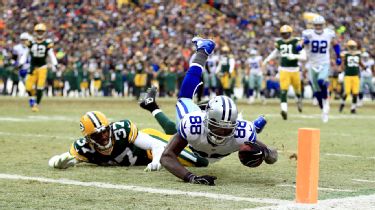 Head coach Bill Parcells of the Dallas Cowboys watches a Green Bay Packers  touchdown replay on the …