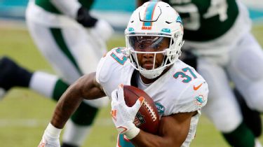 Myles Gaskin of the Miami Dolphins lines up on the line of