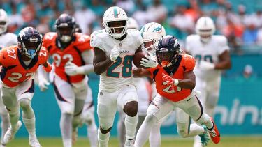 Miami Dolphins score 70 points vs. Broncos in record day - ESPN