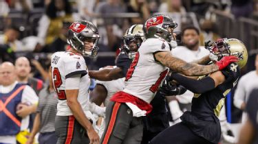 Saints Marshon Lattimore tackles Bucs Mike Evans before the ball is ev, saints