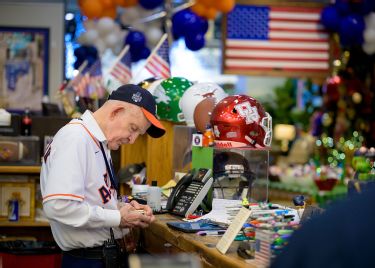 Customers wait hours in line to get money back from Mattress Mack after  Astros World Series win