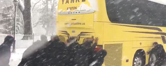 Northeastern women's hoops players push bus in snow