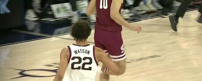 Anton Watson rocks the rim with dunk