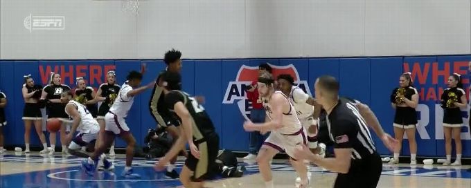 Cam Morris III gets up for the rejection