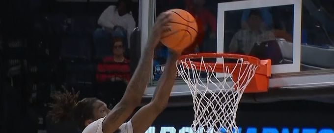 Ja'Vier Francis elevates for an alley-oop dunk