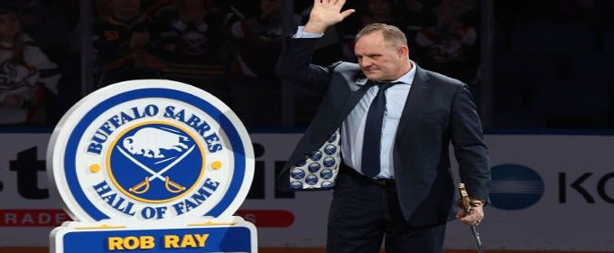 Sabres announcer Rob Ray shakes off puck to head mid-commentary