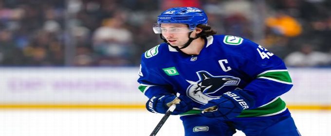 Canucks trade Quinn Hughes to Wild for three players, pick