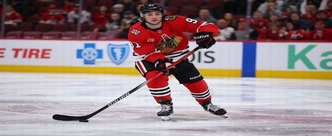Blackhawks' Frank Nazar exits after taking puck to face