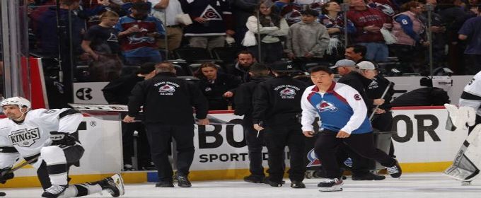 Celebrating Avs fans shatter glass panel behind Kings bench
