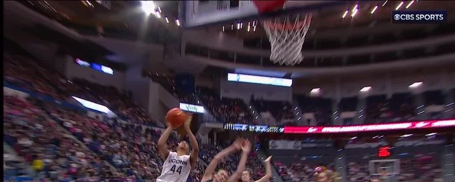 Nika Muhl drops a no-look dime to give UConn the lead